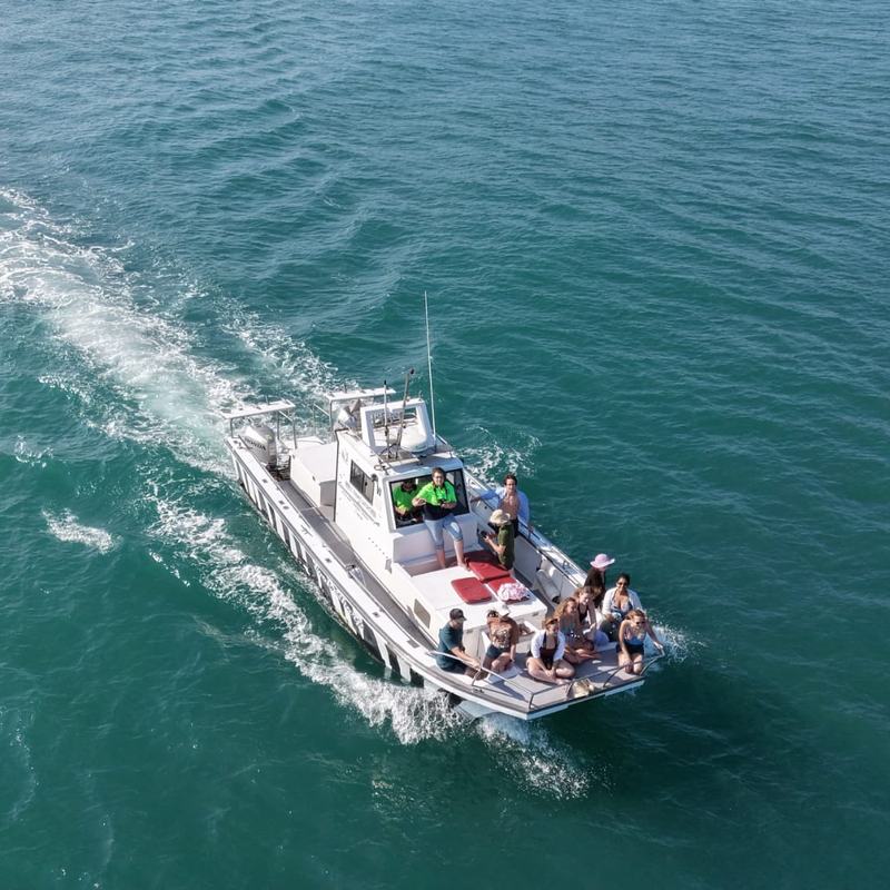 Guests on deck heading out across St Francis Bay